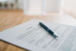 Contract on the desk with a pen